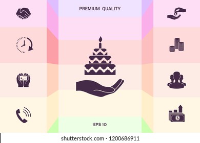 Hand holding a cake icon