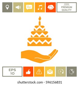 Hand holding a cake icon