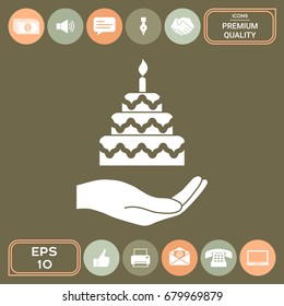 Hand holding a cake icon