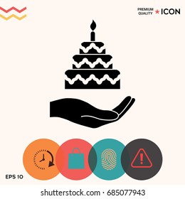 Hand holding a cake icon
