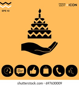 Hand holding a cake icon