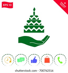 Hand holding a cake icon