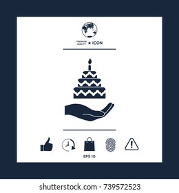 Hand holding a cake icon