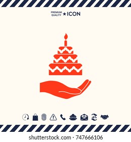 Hand holding a cake icon