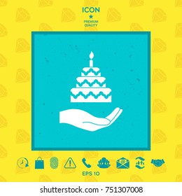 Hand holding a cake icon
