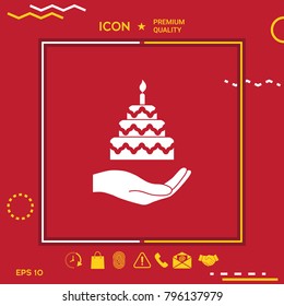 Hand holding a cake icon
