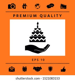 Hand holding a cake icon. Graphic elements for your design