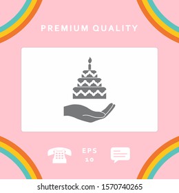 Hand holding a cake icon. Graphic elements for your design