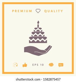 Hand holding a cake icon. Graphic elements for your design
