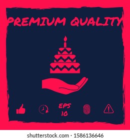Hand holding a cake icon. Graphic elements for your design