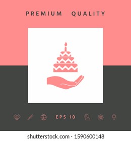 Hand holding a cake icon. Graphic elements for your design