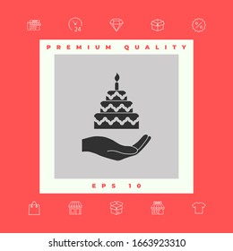 Hand holding a cake icon. Graphic elements for your design