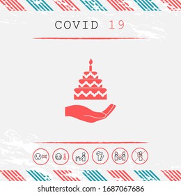 Hand holding a cake icon. Graphic elements for your design