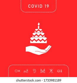 Hand holding a cake icon. Graphic elements for your design