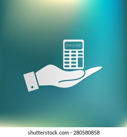 hand holding a calculator. office sign