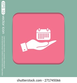 hand holding a calendar sign