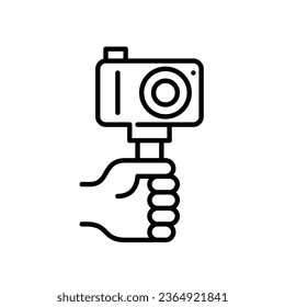 Hand holding a camera on a selfie stick. Filming vlogs or news content. Pixel perfect, editable stroke