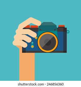 hand holding camera vector