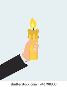 hand holding candle