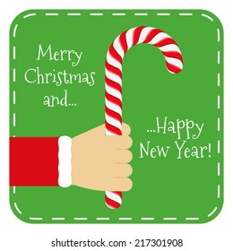 Hand holding candy cane, Christmas card, vector eps10 illustration