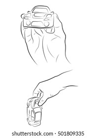 Hand holding car