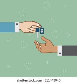 hand holding car key 