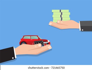 Hand holding car key