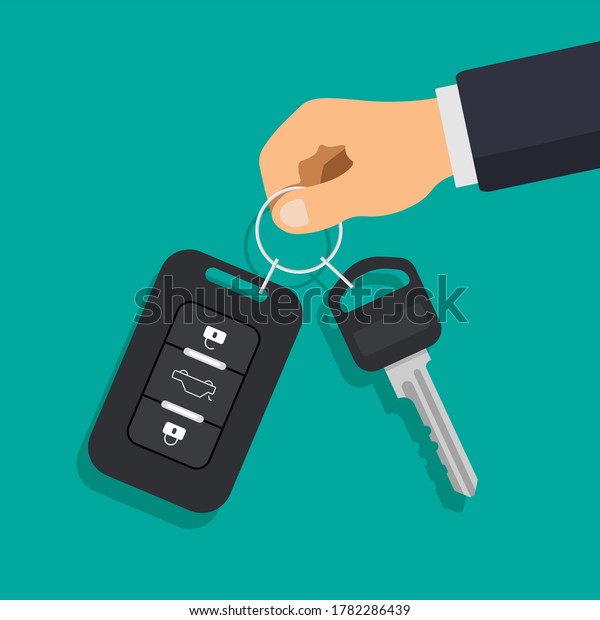 Hand\
holding car key and of the alarm system. Car rental or sale\
concept. Vector illustration in a flat trendy\
style.