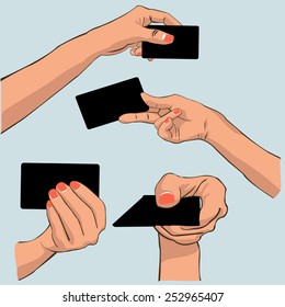 Hand holding card