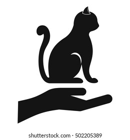 Hand holding a cat icon. Simple illustration of hand holding a cat vector icon for web