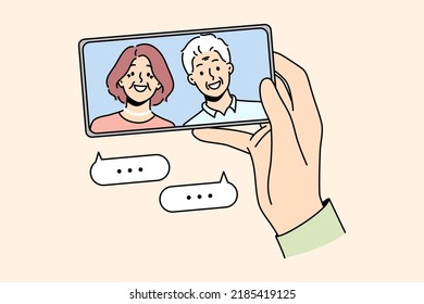 Hand holding cellphone talking with mature parents online on video call. Person have webcam conversation with senior grandparents on smartphone. Vector illustration. 