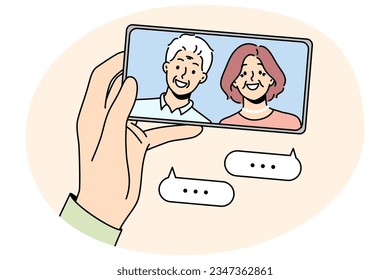 Hand holding cellphone talking with mature parents online on video call. Person have webcam conversation with senior grandparents on smartphone. Vector illustration.