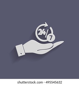 hand holding a character 24 7 sign.
