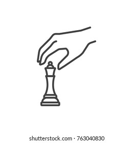 Hand holding chess figure line icon.
