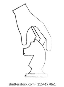 hand holding chess piece knight