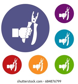 Hand holding chisel icons set