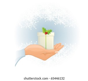 Hand holding Christmas present