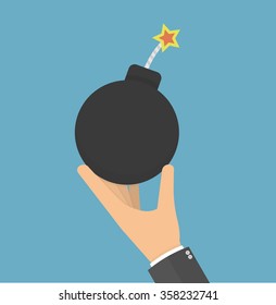 Hand holding circle shaped bomb with burning fuse. Flat style