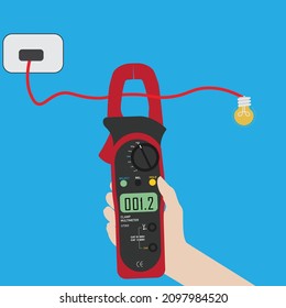  hand holding  clamp multimeter  measuring current from wire