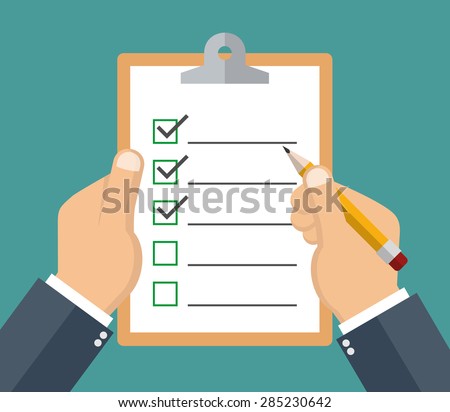 Hand holding clipboard with checklist and pencil