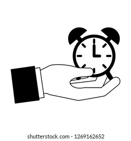 hand holding clock alarm time