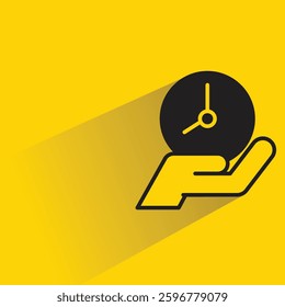 hand holding clock icon on shadow yellow background