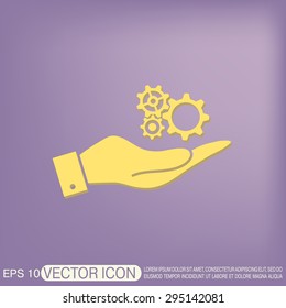 hand holding a cogwheel, icon setting and repair