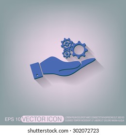 hand holding a cogwheel, icon setting and repair