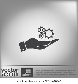 hand holding a cogwheel, icon setting and repair