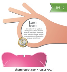 A hand holding a coin