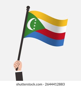 Hand Holding Comoros Waving Flag