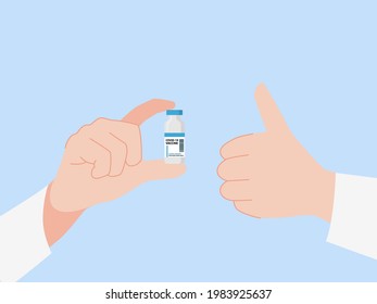Hand holding Covid-19 vaccine bottle for Treatment of Coronavirus. Healthcare and Medical concept.