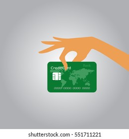Hand holding a credit card.