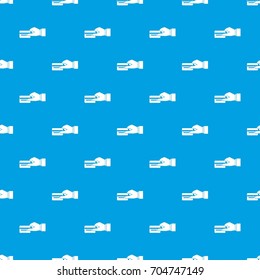 Hand holding a credit card pattern repeat seamless in blue color for any design. Vector geometric illustration